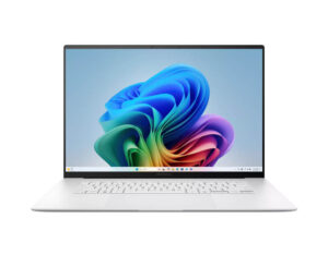 ASUS Zenbook S 16 UX5606 front view with the screen open displaying the wallpaper and keyboard.